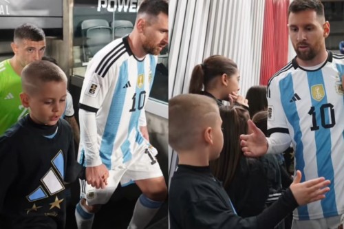Salió de la mano de Messi frente a Ecuador, le regaló figuritas y el Dibu Martínez sorprendió con su gesto