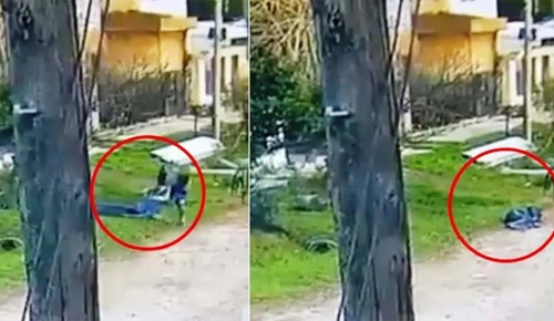 Como si fuera la bolsa de basura: un hombre sacó a la calle el cadáver de su vecino y quedó filmado