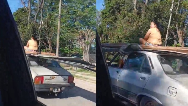 Insólito: Una mujer fue filmada viajando en el techo de un auto en La Plata